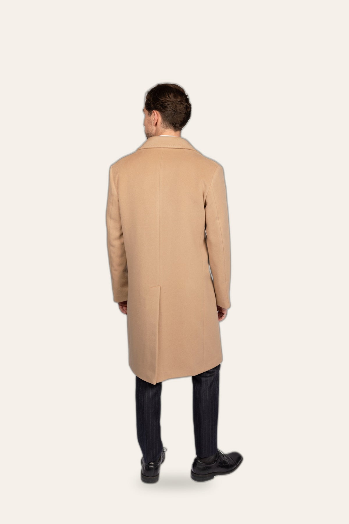 Double-breasted camel coat, back view — DAÉIN