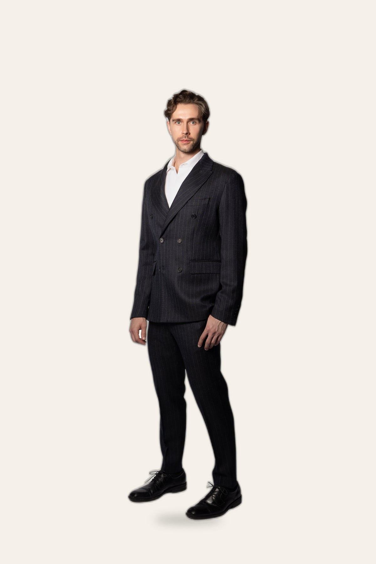 Pinstripe wool blazer, three-quarter view — DAÉIN
