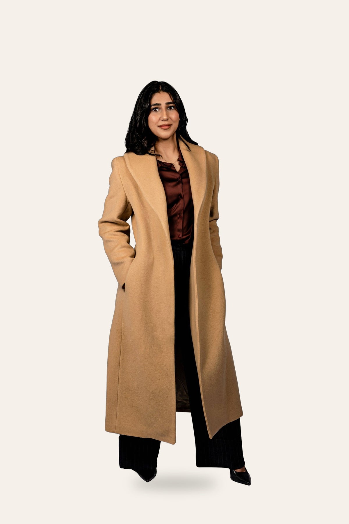 Belted camel coat, front view — DAÉIN