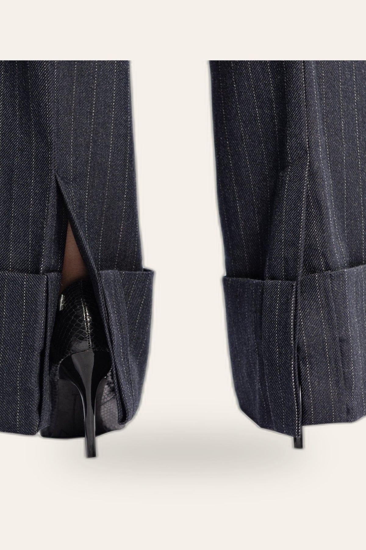 Wide-leg pinstripe trouser cuff detail — DAÉIN
